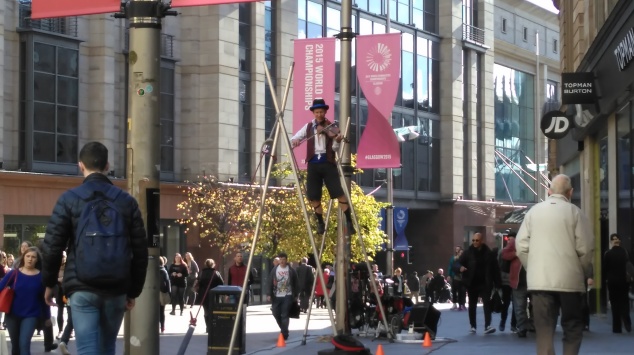 Just a wierd man playing a violin while walking a tightrope. Standard in Glasgow